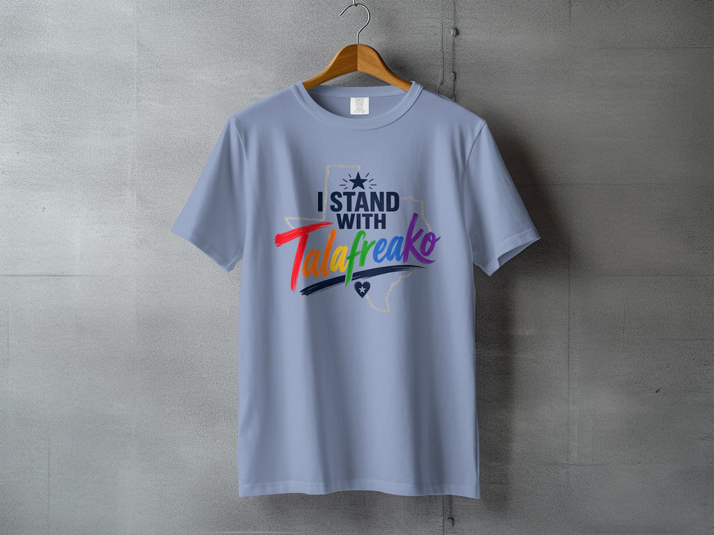 Light blue t-shirt with "I STAND WITH" and Texas graphic.