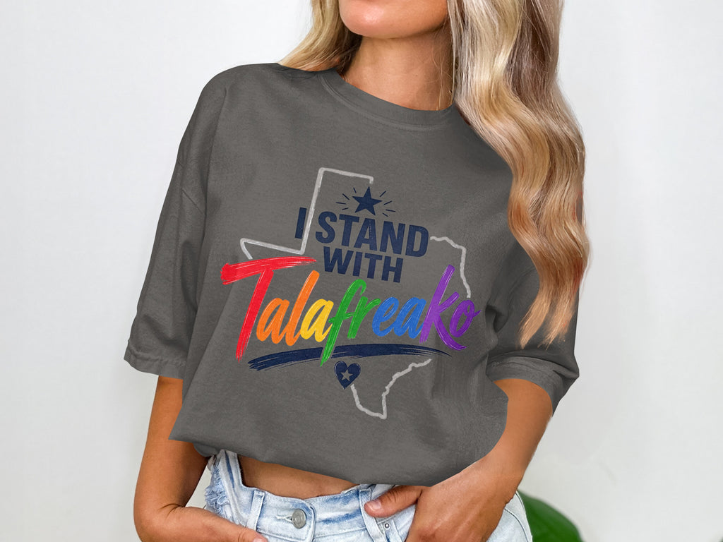 Dark gray t-shirt with rainbow text "I STAND WITH Talafreak" inside Texas outline.