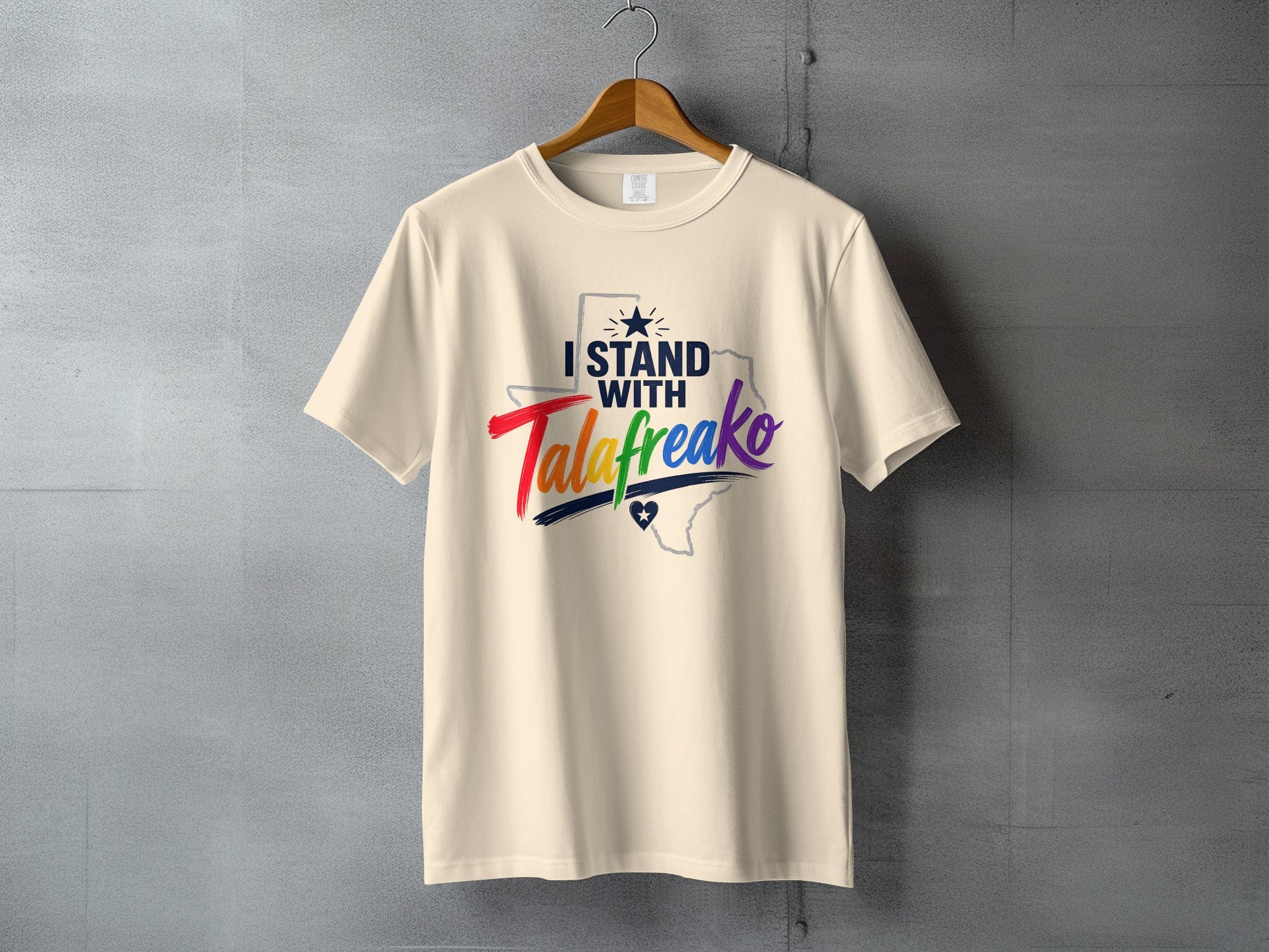 Cream t-shirt with "I Stand with TalaFreako" text and Texas outline.