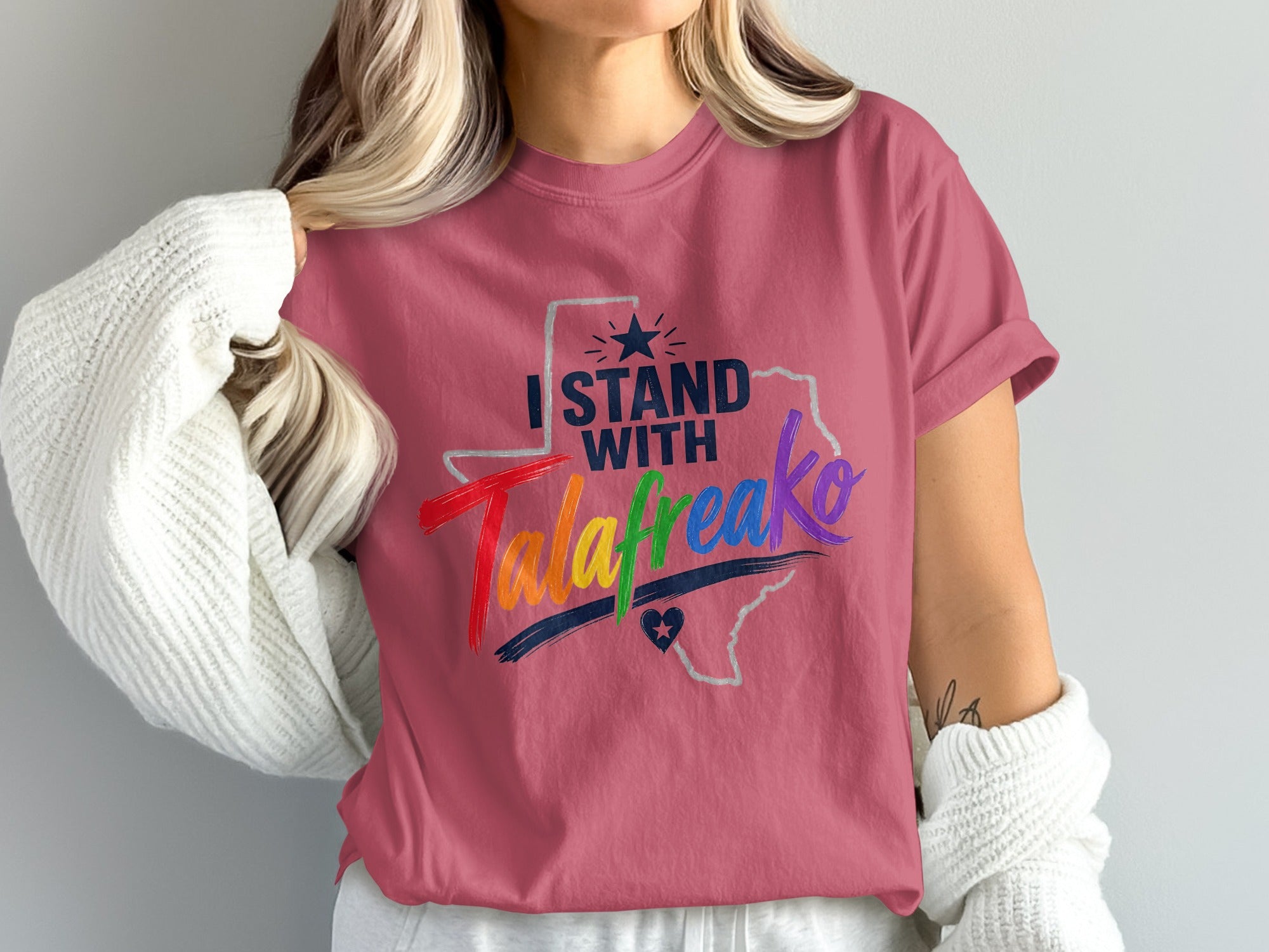 T-shirt with "I Stand With" and rainbow-colored "Tafreako" above Texas outline.