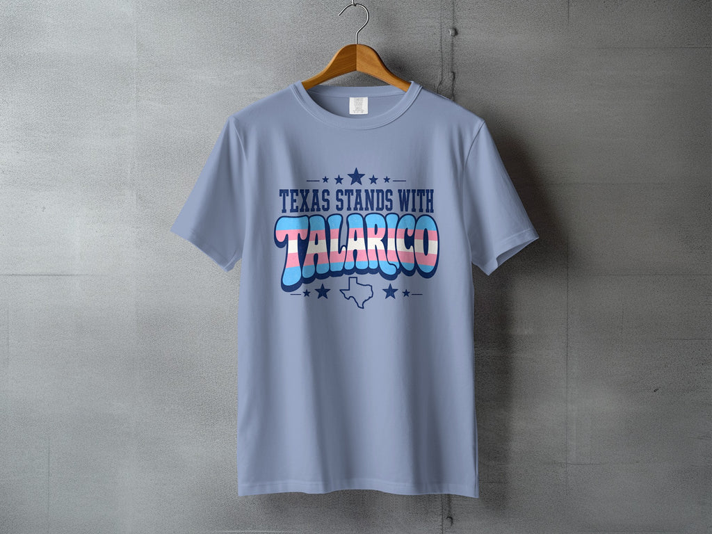 Light blue t-shirt with "TEXAS STANDS WITH TALARICO" and trans flag colors.
