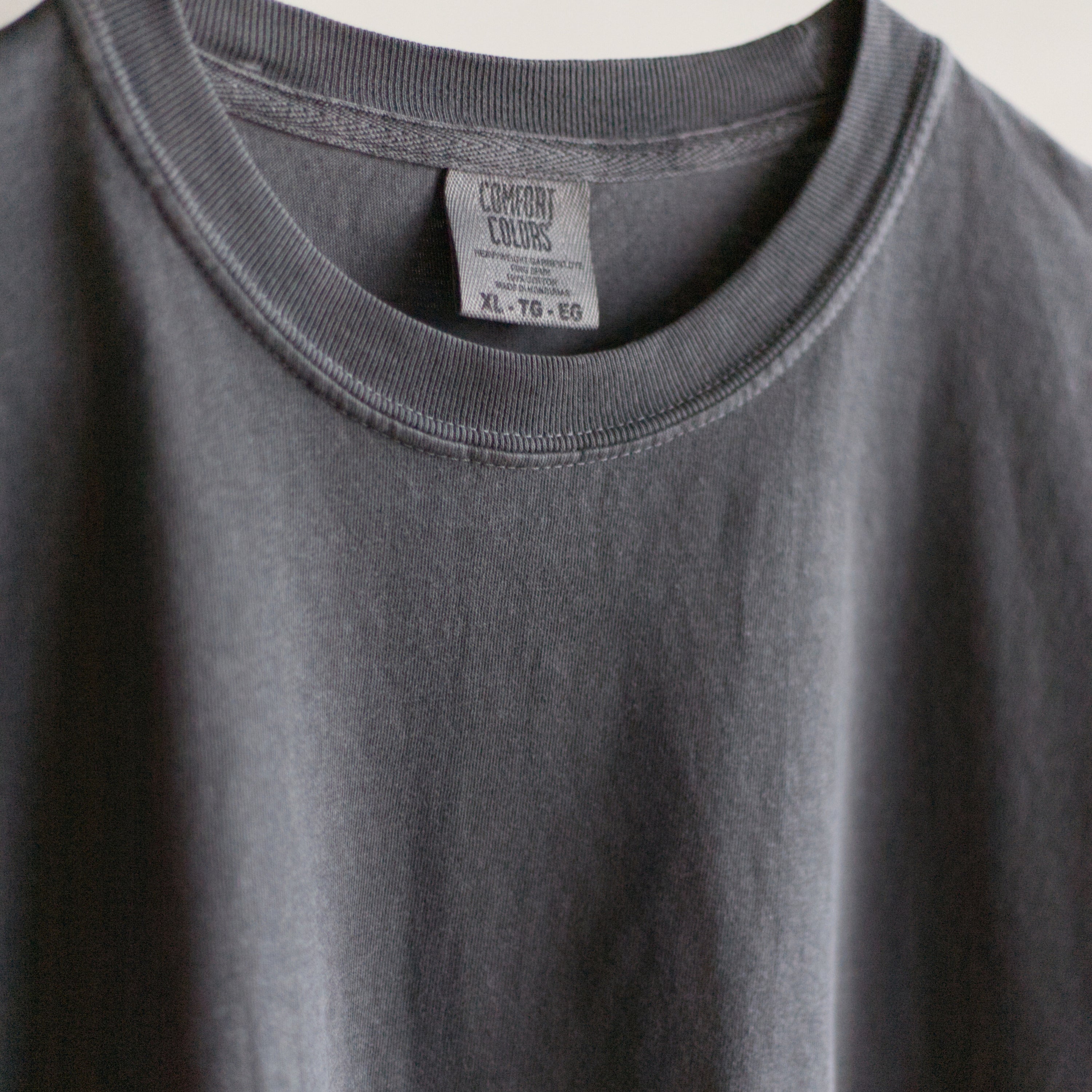 Comfort Colors t-shirt tag showing size XL-TG-EG.